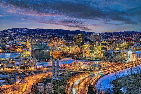 Oslo Norway, night city skyline at business district and Barcode Project