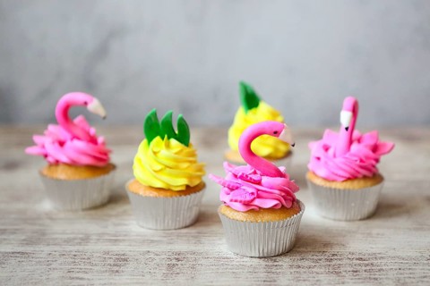 Pink flamingo and pineapple cupcakes for the Birthday party. Tropical party