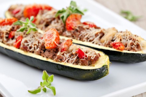 Zucchini halves stuffed with minced meat and vegetable