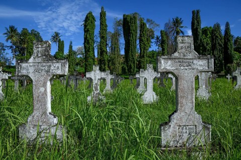 Graves on the cemetery of the Catholic mission of Vunapope, Kokopo, formerly Herbertshöhe, from