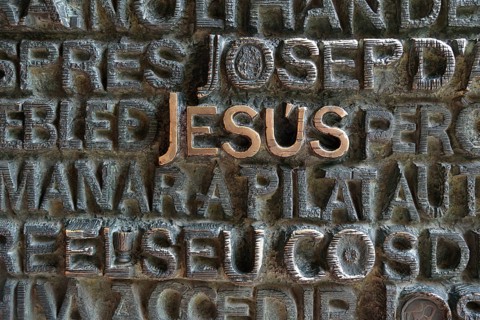 Inscription "Jesus" on the portal of the Passion façade of the Sagrada Familia, Holy Family Church