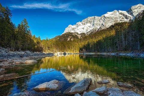 Frillensee (small lake near Eibsee) and Zugspitze, the highest mountain in Germany