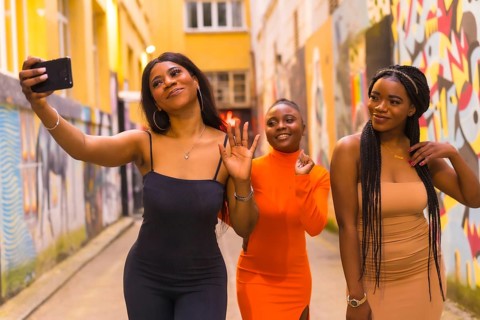 San Sebastián, Gipuzkoa Spain, February 2021: Three girls taking a selfie. Fashionable urban style
