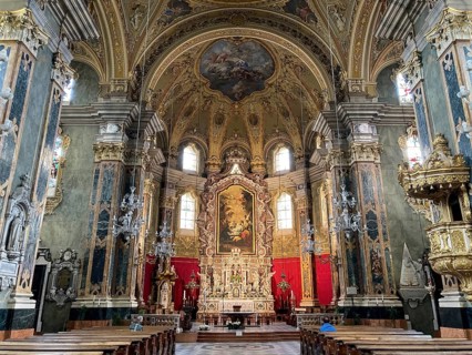 View from interior central nave nave to apse with altar of Bressanone Cathedral Brixen Cathedral