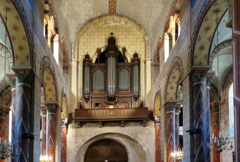 Organ loft of Saint Austremoine church, Issoire. Puy de Dome department. Auvergne-Rhone-Alpes,
