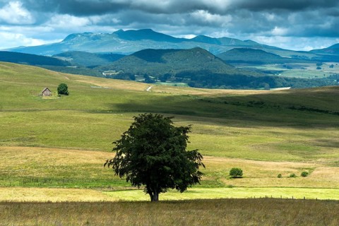 Plateau of Cezallier in the foreground, Massif du Sancy in the background. Auvergne volcanoes