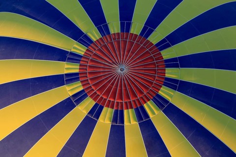 Interior view of a hot air balloon with yellow-blue stripes and red centre, Turkey, Asia