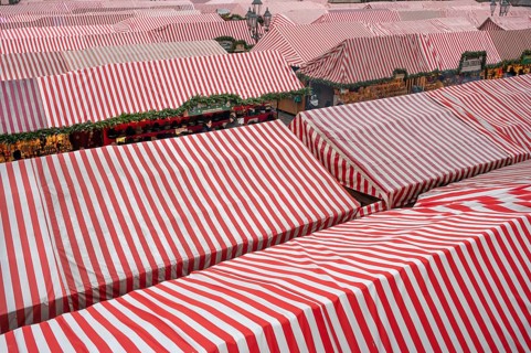 Red and white roofs of the stalls at the Christkindlesmarkt on the main market square, Nuremberg,