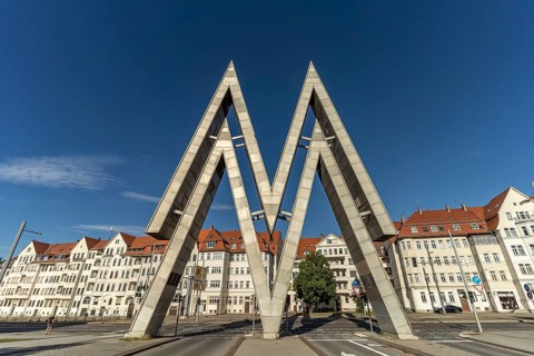 The huge double-M logo of the Leipzig Trade Fair Centre at the East Gate of the Old Leipzig Trade