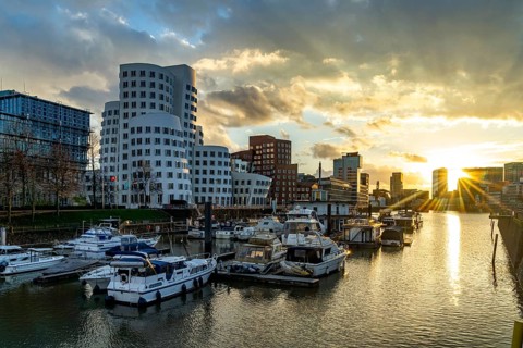 Gehry buildings - Neuer Zollhof at the Media Harbour in Düsseldorf at sunset, North