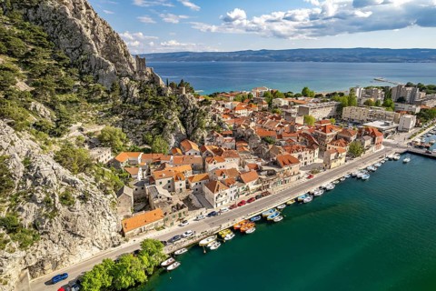 The old town centre of Omis with the ruins of the Mirabella or Peovica fortress seen from above,