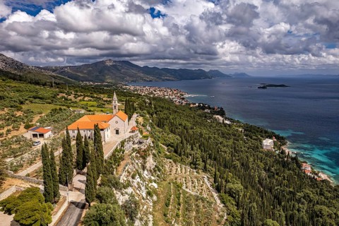 Franciscan monastery and church Madonna of the Angels and the coast seen from above, Orebic,