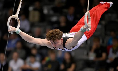 Alexander Kurz GER rings action gymnastics, EnBW DTB-Pokal, Porsche-Arena, Stuttgart,