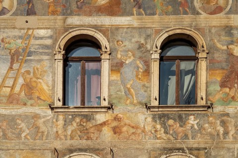 The painted façade of the Case Cazuffi Rella houses on Piazza del Duomo in Trento, Trentino, Italy,