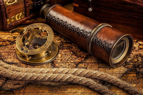 Travel geography navigation concept background, old vintage retro compass with sundial, spyglass