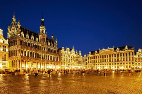 BRUSSELS, BELGIUM, MAY 31, 2018: Grote Markt (Grand Place) square crowded with tourists illuminated