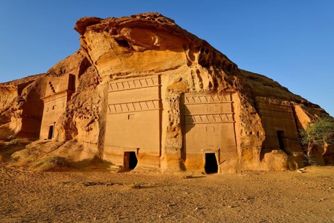 Nabataean tombs at Djabal Al-Ahmar in first light, Hegra or Mada'in Salih, AlUla region, Medina