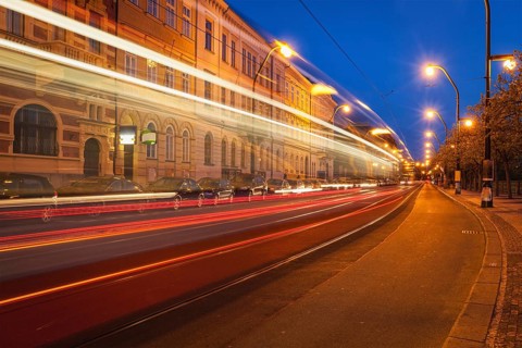 Blurred light trails of Prague tram in twilight. Prague, Czech republic