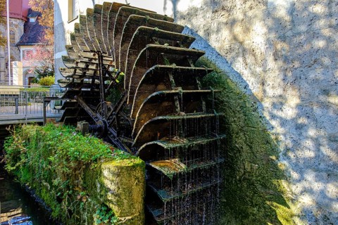 Historical mill wheel at the Klostermühle town museum, Bad Urach, Swabian Alb, Baden-Württemberg,