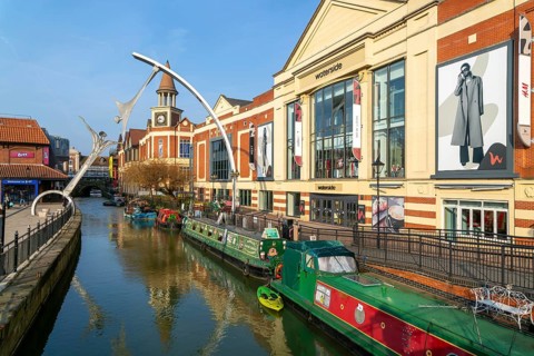Narrow boats River Witham waterside shopping centre, Lincoln, Lincolnshire, England, UK -