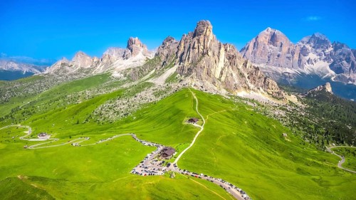 Breathtaking aerial view of the scenic passo giau with its winding road and the majestic nuvolau