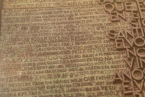 Lord's prayer written in many different languages, creating a spiritual and multicultural tapestry