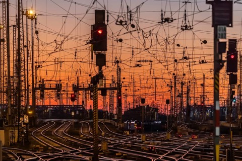 Track apron with trains, rails, points, pylons and signalling systems. Infrastructure at the main