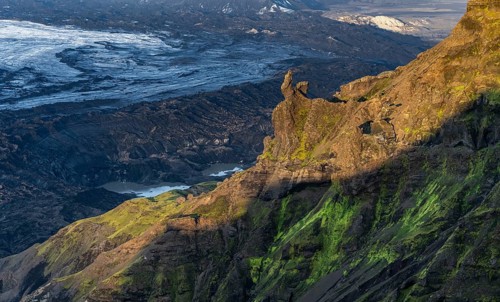 Cliff in the evening light, Impressive landscape with mountains and glaciers, Huldujökull and