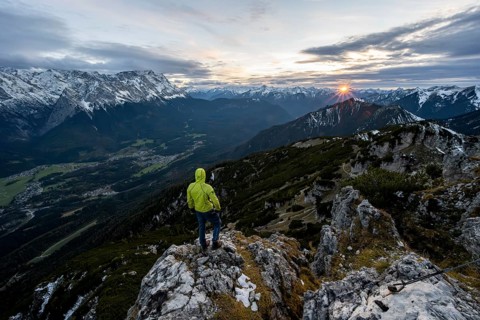 View Mountain panorama with Wetterstein mountains and Zugspitze, at sunset with sun star,