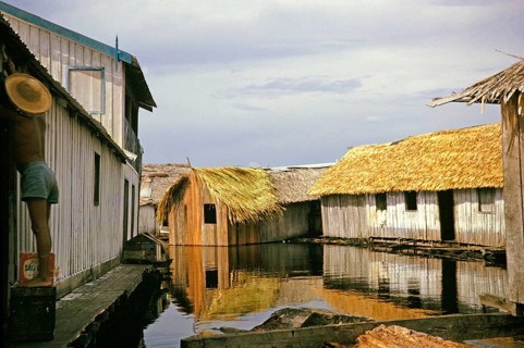 Informal housing built on logs, known as the floating city, Manaus, Brazil 1962, which was removed