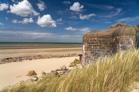 World War II bunker on the beach at Leffrinckoucke on the Côte d'Opale or Opal Coast, France,