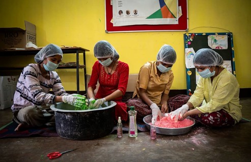 Students of Ashaneer Home makes organic coloured powder ahead of Holi Festival, in Guwahati, India