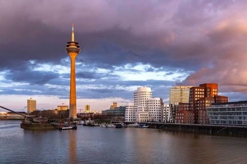 Gehry buildings - Neuer Zollhof at the Media Harbour and the Rhine Tower in Düsseldorf, North