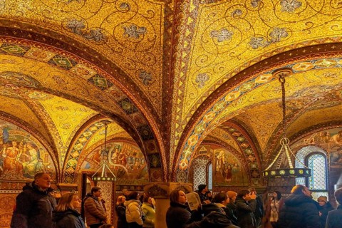Visitors group in the Elisabethkemenate, medieval woman's chamber in the Wartburg in Eisenach,
