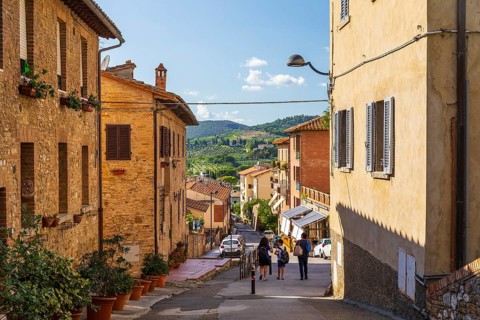 Street with views of the surrounding hills, San Gimignano, Tuscany, Province of Siena, Italy,