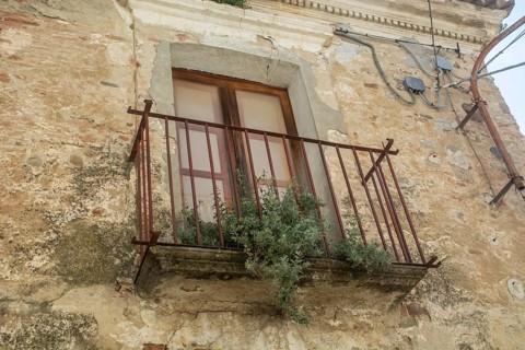 Balcony on an old house in Aliano, the very poor village in southern Italy that the writer Carlo