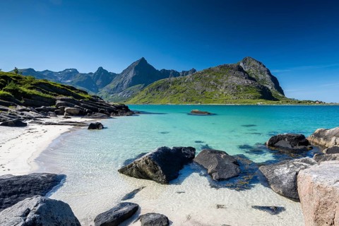 Sandy beach beach and turquoise sea, Flakstadoya, Lofoten, Norway, Europe