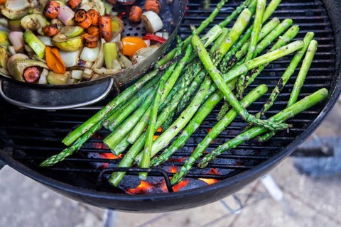 Barbecue, kettle grill with vegetarian and vegan barbecue grills such as grill pan and green