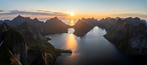 View of mountains in Reinefjord, midnight sun, Reine, Lofoten, Norway, Europe