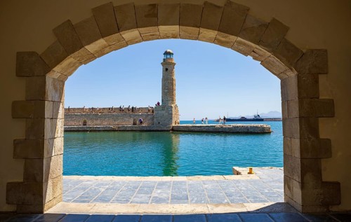 Lighthouse at the old Venetian harbour, Rethymno, Crete, Greece, Europe