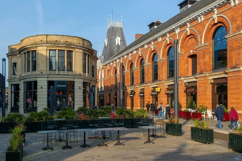 Shops in Cornhill Quarter shopping area in city centre, Lincoln, Lincolnshire, England, UK
