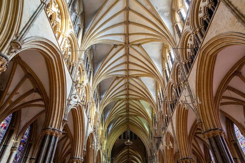 Vaulted nave ceiling roof of medieval Lincoln cathedral interior, city of Lincoln, Lincolnshire,