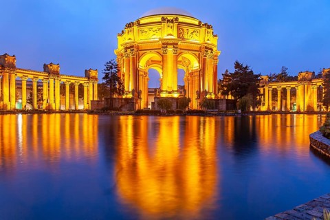 The illuminated Palace of Fine Arts in the Marina District in San Francisco at night, California,