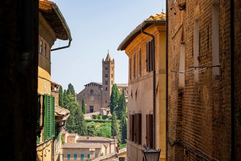 Old town with view of Basilica di San Clemente, historical, building, alley, Siena, Tuscany, Italy,