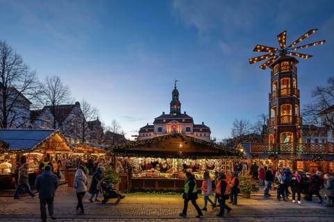 Large Christmas pyramid at the Christmas market at dusk, behind the town hall, Lüneburg, Lower