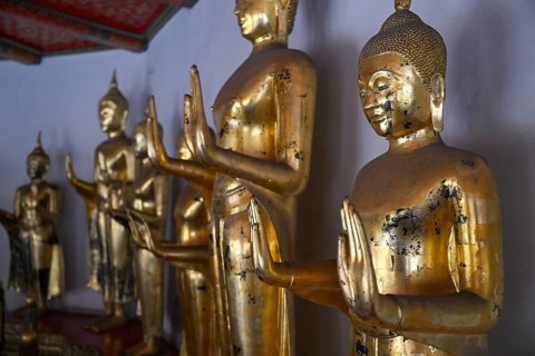 Gilded Buddha statues in Wat Pho, Temple of the Reclining Buddha, Bangkok, Thailand, Asia