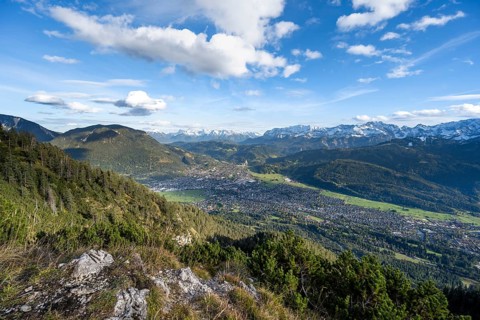 View of Garmisch-Partenkirchen and mountain panorama, hike to Kramerspitz, in autumn, Ammergau