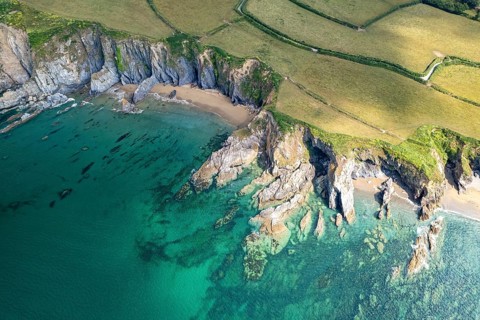 Hemmick Beach and the coast of St Austell seen from the air, Cornwall, England, United Kingdom,