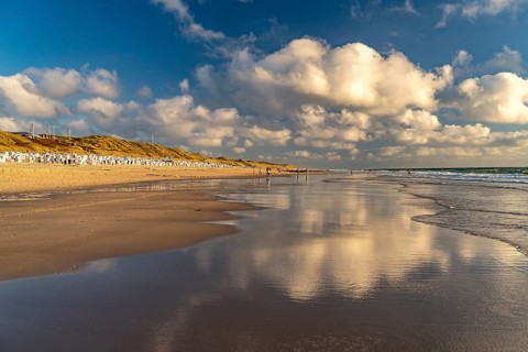 Clouds reflected in the water on the west beach near Westerland, island of Sylt, district of North