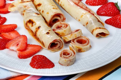 Swabian cuisine, filled pancakes, Flädle with strawberry jam, Gsälz, fresh strawberries, sweet,